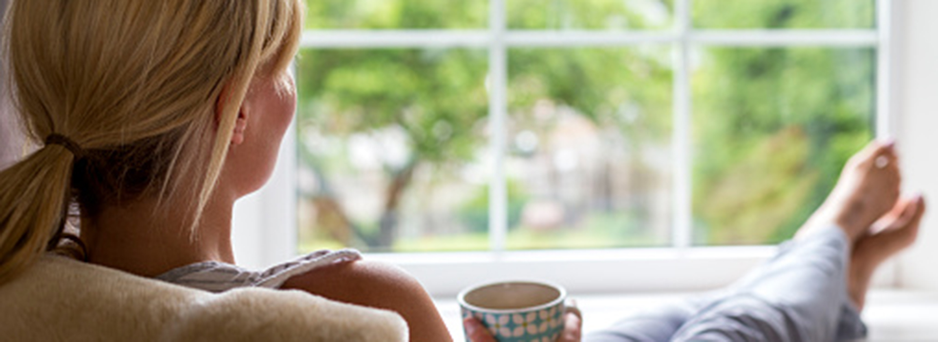 Woman thinking about selling a new home